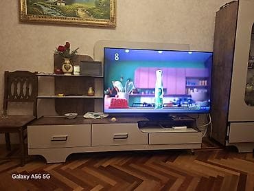 acıq dolab: TV altlığı — 2