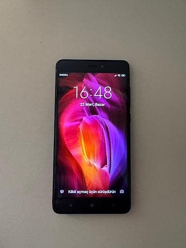 limitsiz internet: Xiaomi 16 GB, rəng - Qara, 
 İki sim kartlı — 3