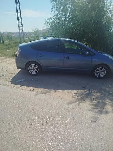 gen: Toyota Prius (2-ci nəsil) hibrid hetçbek - Göy rəngli kuzov, 5 qapı — 5