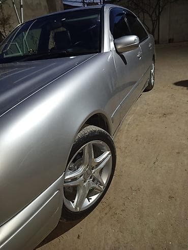 skoda: Mercedes-Benz E-Class: 2.4 l | 1998 il Sedan — 5