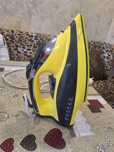 blu ray player: Buxarlı ütü – sarı/qara korpus, “Superior Glide Titanium” altlıq - — 2