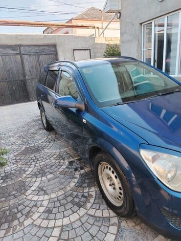 fiat doblo ölüxana: Opel Astra H Caravan (universal), göy rəng. - Kuzov: universal — 6