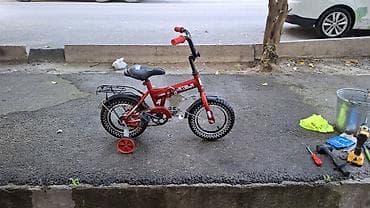 12 lik usaq velosipeti əla vəziyyətdədir hec bir problemi yoxdur usaq