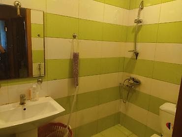 mingecevirde satilan evler: Iki otaq . iki hamam tualeti var . 18 mertebenin 14 mertebesi — 4