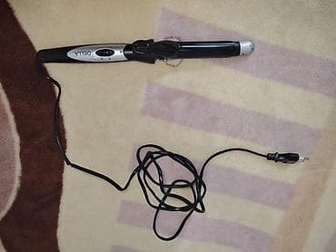 DELLA markalı saç buran maşın (buruq maşın). Silindrik formalı ısıtıcı