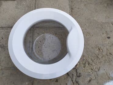 Ağ rəngli, dəyirmi formalı paltaryuyan maşın qapısı. Şəffaf pəncərə lalafo.az -da Ağ rəngli, dəyirmi formalı paltaryuyan maşın qapısı. Şəffaf pəncərə