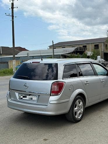 16lıq disk: Opel Astra: 1.3 l | 2010 il 348000 km Universal — 9
