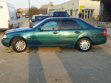бампер на мерседес w210: Mercedes-Benz markalı, tünd firuzəyi rəngli sedan. Avtomobil rahat və — 2