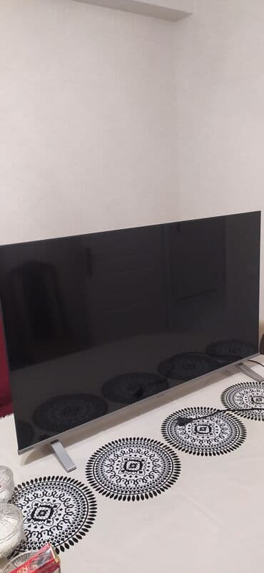 shivaki 82 ekran smart: Televizor – böyük ekranlı LED/Smart TV - Təxminən 55–65 düym — 1