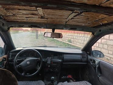 опель зафира а: Yaşıl rəngli Opel Vectra sedan avtomobili etibarlı nəqliyyat vasitəsi — 4