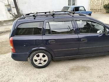 lapet satisi: Opel Astra Caravan (universal) – tünd mavi rəng. Xüsusiyyətlər: - — 3