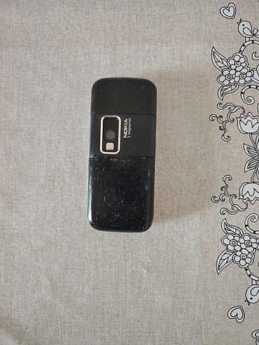 panel kamera: Nokia < 2 GB Memory Capacity, rəng - Gümüşü, Düyməli — 3