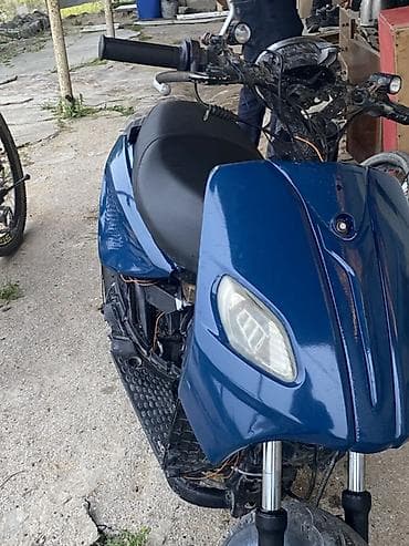 vito guzgu: Skuter/moped – benzinlə işləyən, şəhər içi rahat hərəkət üçün kompakt — 3