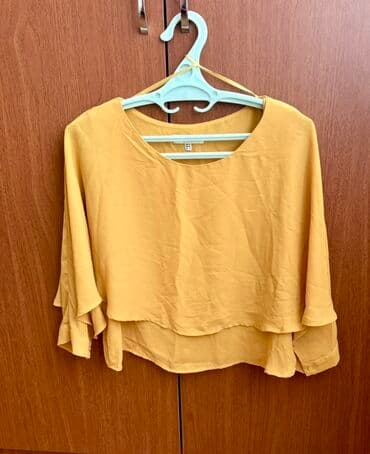 Koton markasına aid, sarı rəngində, qat-qat dizaynlı bluz. Yüngül lalafo.az -da Koton markasına aid, sarı rəngində, qat-qat dizaynlı bluz. Yüngül