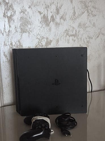 Video oyunlar və konsollar: Salam, PS4 Pro satılır. Yaxşı vəziyyətdədir, çox az istifadə olunub. 1 — 2