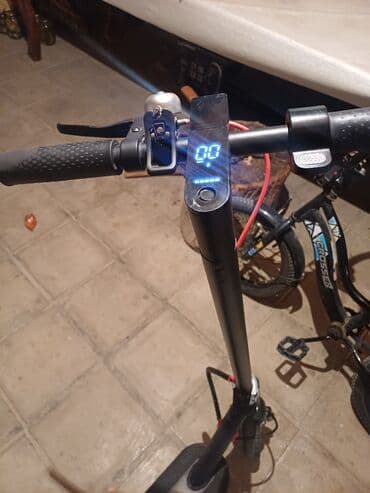 elektron sukuter: Elektrikli skuter – qatlana bilən, şəhər içi rahat hərəkət üçün — 4