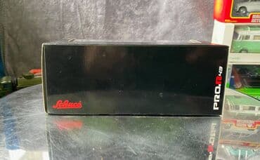 metbex tavan modelleri: Коллекционная модель Mercedes-Benz 200 W123 Hearse black 1982 Schuco — 7