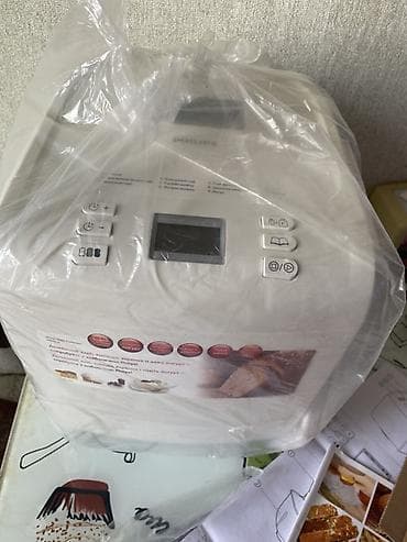 Philips Daily Collection çörəkbişirən aparat. Ağ rəngli, kompakt