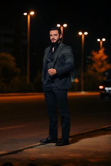 Məhsul: Kişi üçlü kostyum dəsti Təsvir: - Rəng: Tünd boz (incə tünd