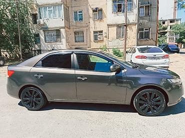mini cooper kreditle: Kia Cerato: 1.6 l | 2011 il Sedan — 3