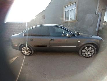 mersedes e klas: Volkswagen Passat: 1.8 l | 2004 il Sedan — 4