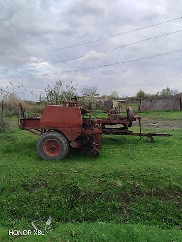 traxdir tekeri: Məhsul: Traktor + ot bağlayan pres (saman presi) qoşqu Təsvir: - Kənd — 7