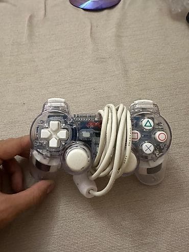 ps1 disk: PlayStation 2 Slim oyun konsolu. Kompakt və nazik korpusa malik PS2 — 6