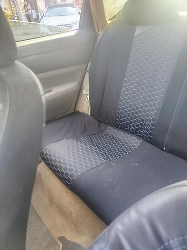 gen: Toyota Prius (2-ci nəsil) hibrid hetçbek - Göy rəngli kuzov, 5 qapı — 7