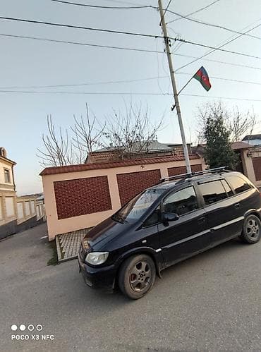 запчасти форд фокус 1: Opel Zafira A, qara rəng, 7 yerlik miniven. Xüsusiyyətlər: - Geniş — 2