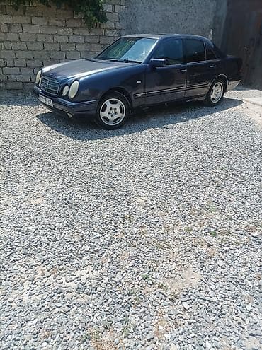 w210 disk teker: Mercedes-Benz E-Class (W210), sedan, tünd göy rəng. - Kuzov: 4 qapı — 1