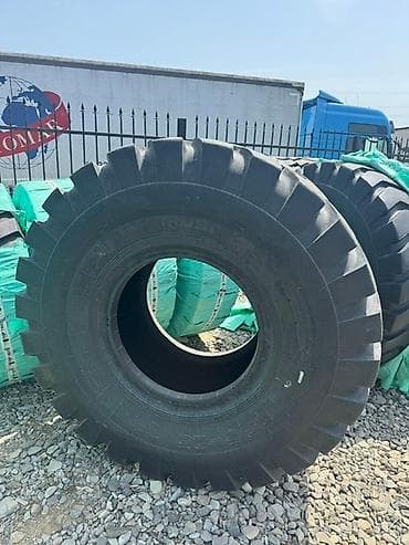 mini canqan: Yeni Şin 235 / 50 / R 25 — 1