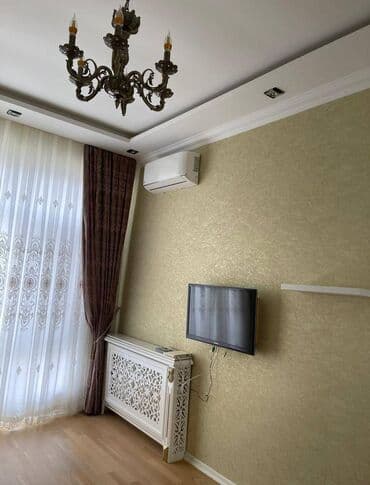 mingecevir yeni tikili binalar: Nizami metrosunun yaxınlığında 19 mertebeli binanın 14-cü — 18