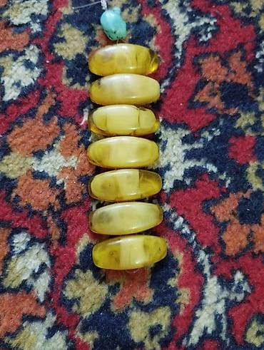 Sarı tonlarda iri, ellips formalı muncuq dəsti. - Təxminən 7 ədəd — 1