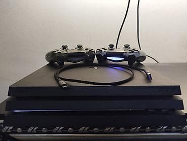 iphone 11 pro max qiymet: PlayStation 4 Pro (PS4 Pro) konsolu Komplekt: - PS4 Pro 1TB konsol — 1