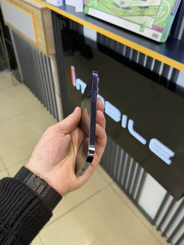 Sony: IPhone 14 Pro, 128 GB, Deep Purple, Face ID — 7