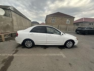 Kia Cerato: 2 l | 2007 il Sedan