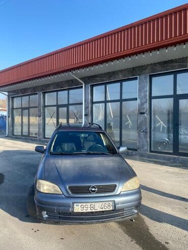 oka satılır: Model: Opel Astra Caravan (universal kuzov) Rəng: tünd boz Yanacaq — 8