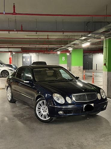 07 disk: Mercedes-Benz E 320: 3.2 l | Sedan — 8