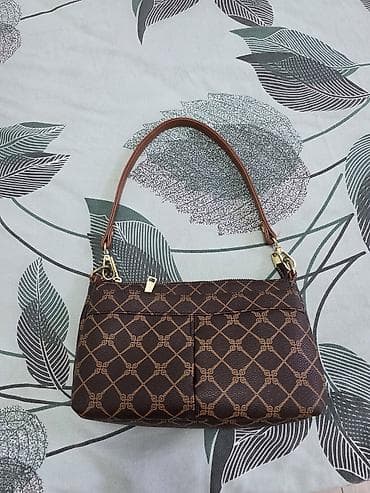 Qadın çantası – qısa saplı, çiyin və ya qoltuqaltı daşımağa uyğun. -