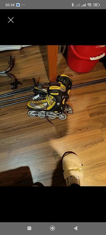 CD, DVD disklər və kassetlər: İnline təkərli konki (roller skates) - Rəng: sarı-qara - Tip: inline — 1