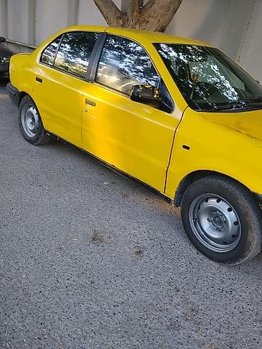 turbo az qaz 21: Model: Iran Khodro Samand (sedan) Kuzov: 4 qapı, sarı/qara rəng sxemi — 7