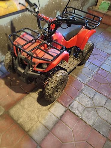 katalka uşaq motosikli: Uşaqlar üçün benzinli mini ATV/kvadrosikl Xüsusiyyətlər: - Gövdə — 1