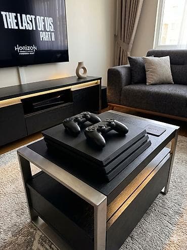 Playstation 4 pro satılır 2 orginal pult ilə içində 15 ədəd oyun var — 1