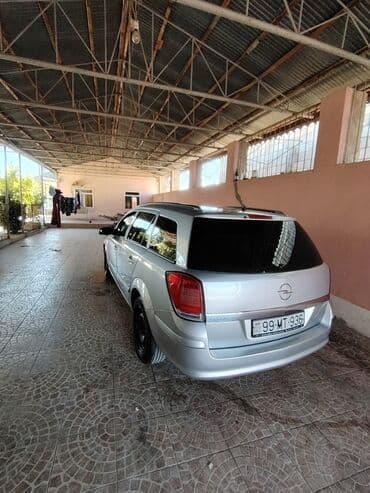 disk təkər type 0: Opel Astra H hatchback – gümüş rəng. Əsas xüsusiyyətlər: 2006 furqon — 7