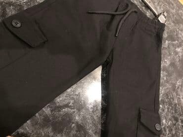 salvarlar ve koftalar: Qara karqo cibli şalvar yenidir 9 yaş rəngi tünd qaradlr şəkildə acıq — 1