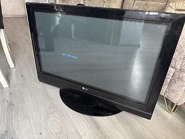 LG televizor – klassik model, masaüstü dayaqlı. Ölçü: təxminən 32–37 — 4