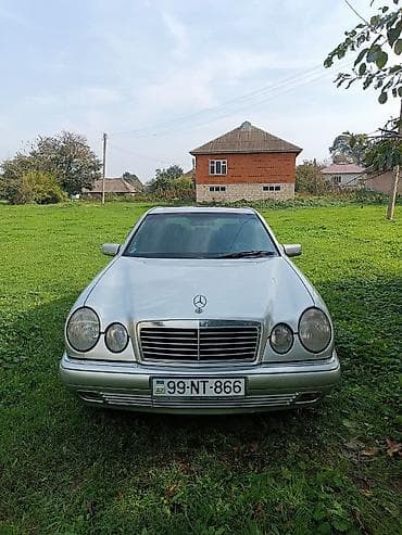 mersedes s klass: Mercedes-Benz E-Class: 2.4 l | 1998 il Sedan — 8