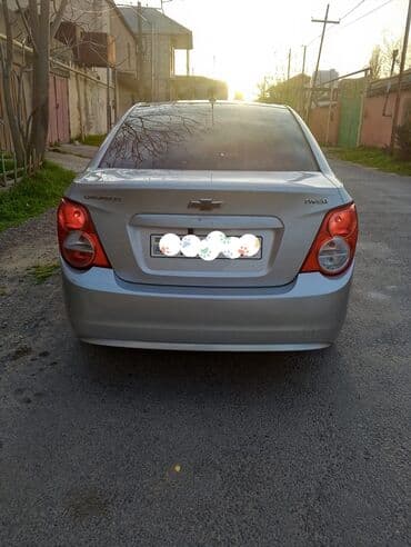 qadın üçün maşınlar: Chevrolet Aveo: 1.4 l | 2012 il 193600 km Sedan — 8