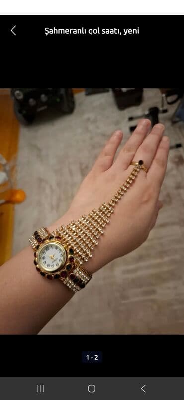 qiymətli daş adları: Şahmeranlı qol saatı bilərzik və üzük birləşməsidir. Saatın ətrafı və — 3