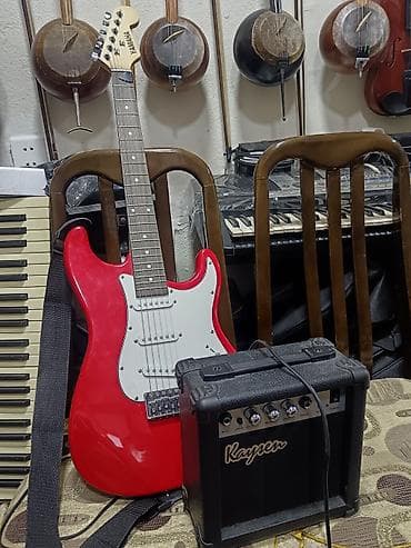 elektro gitara qiymetleri: Dəst satılır üstündə amfi çexol şnur mizrab stoyka kapo və s — 1